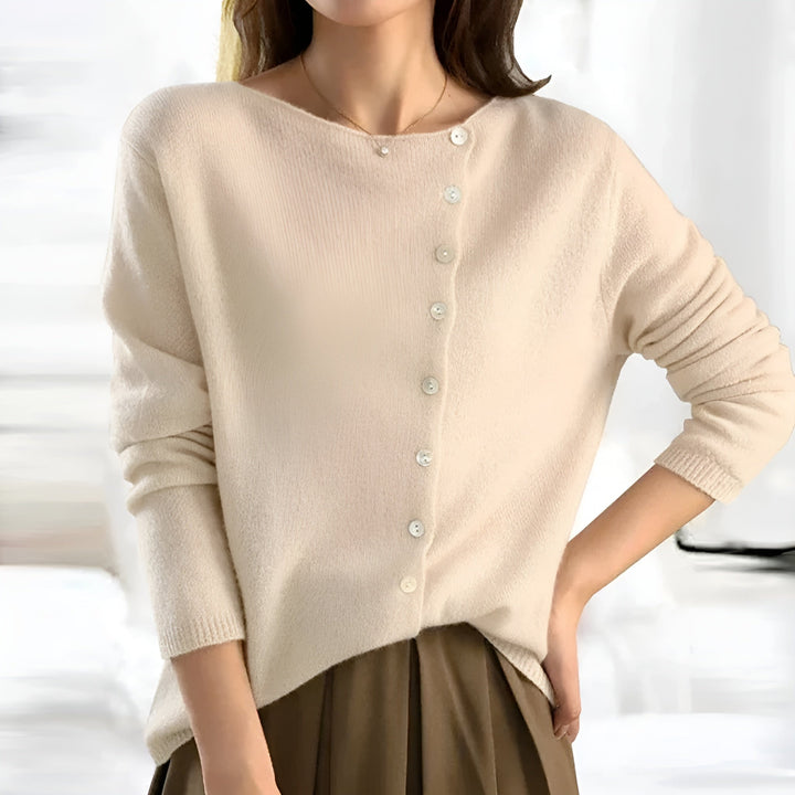 Beige button-front knit sweater with V-neck and long sleeves, ribbed cuffs