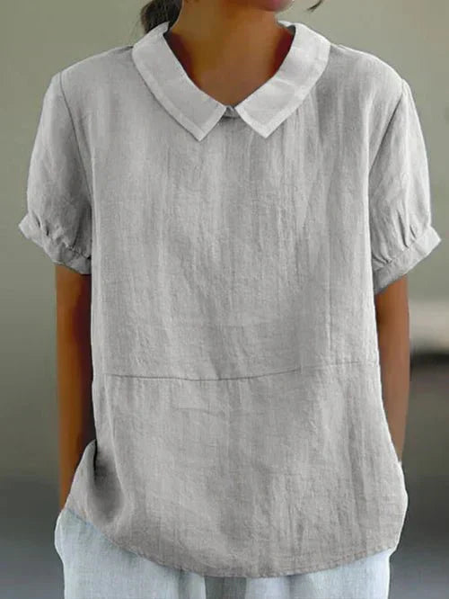 Lina soft-collar blouse, white, short sleeves with soft pointed collar and gathered hem