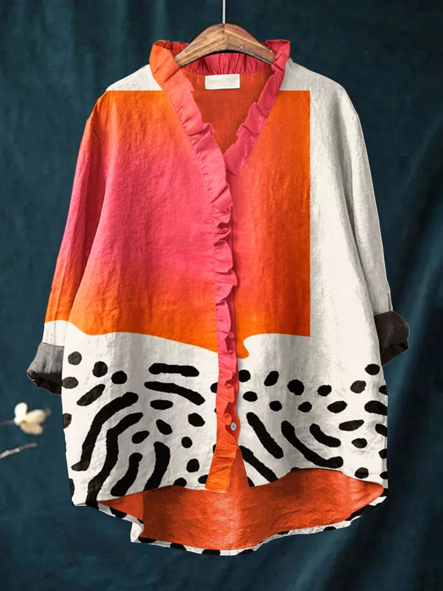 Relaxed linen blouse with color-block front, ruffled button placket, abstract orange-white print
