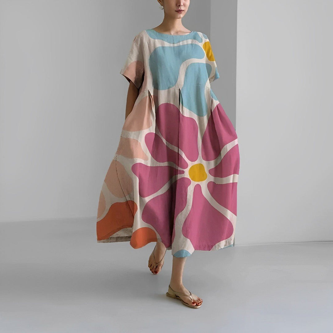 Abstract floral flow dress, pink and teal with multicolor large petal print, loose midi.