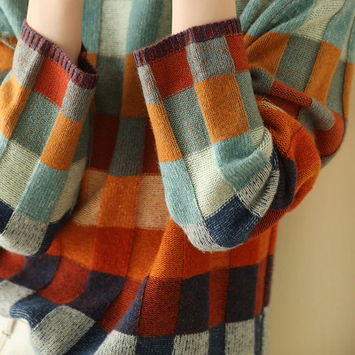 Colorblock checkered sweater sleeves with ribbed cuffs; multicolor square knit