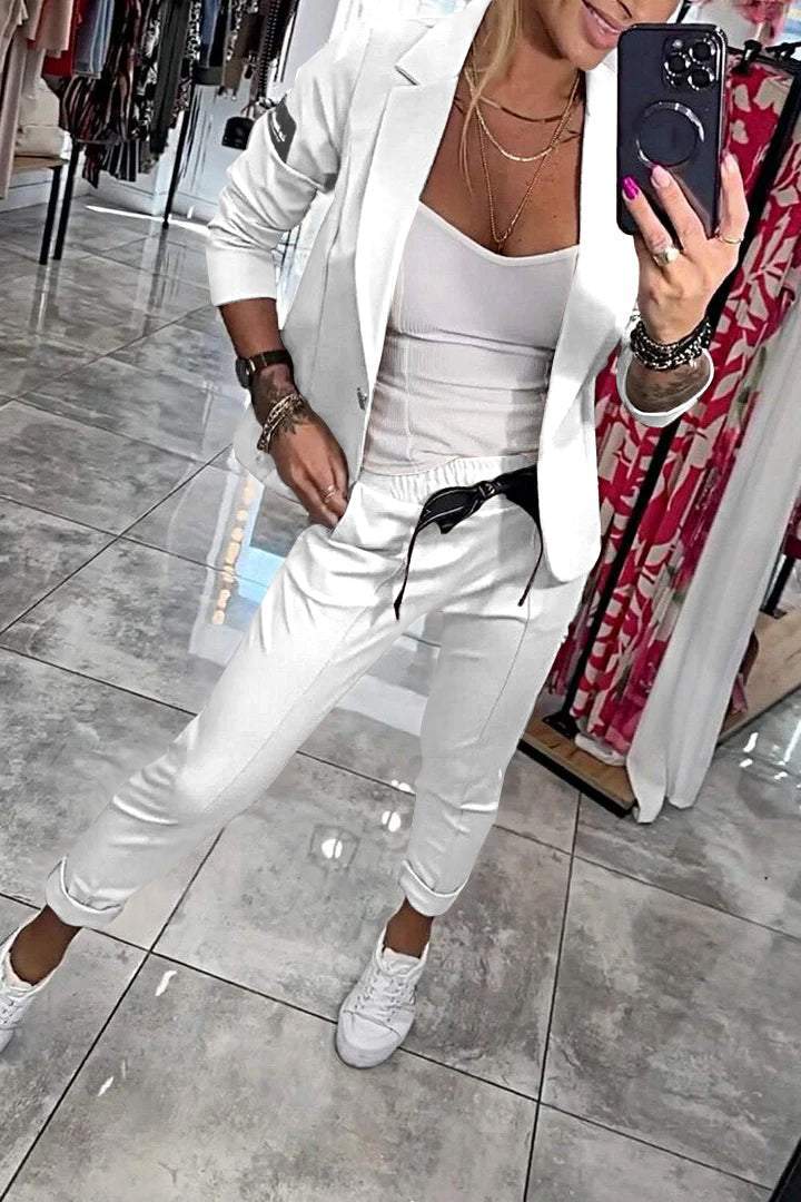 White casual blazer and matching trousers set, open front over white tank