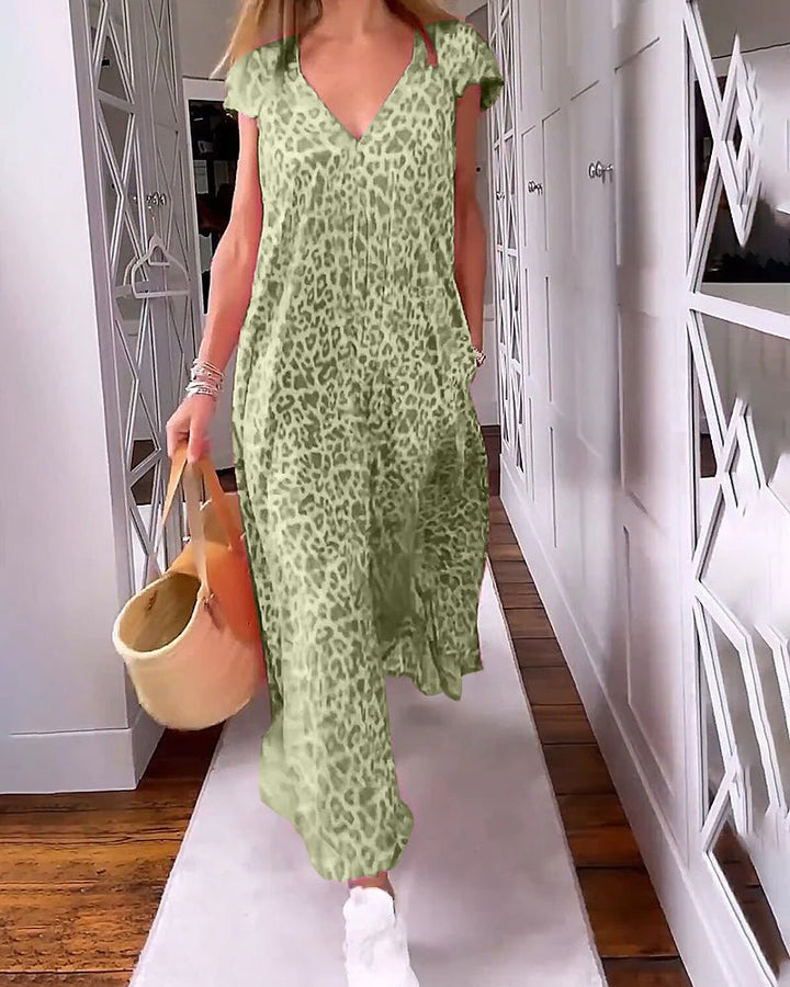 Light green leopard-print relaxed maxi dress with V-neck and flowing maxi length