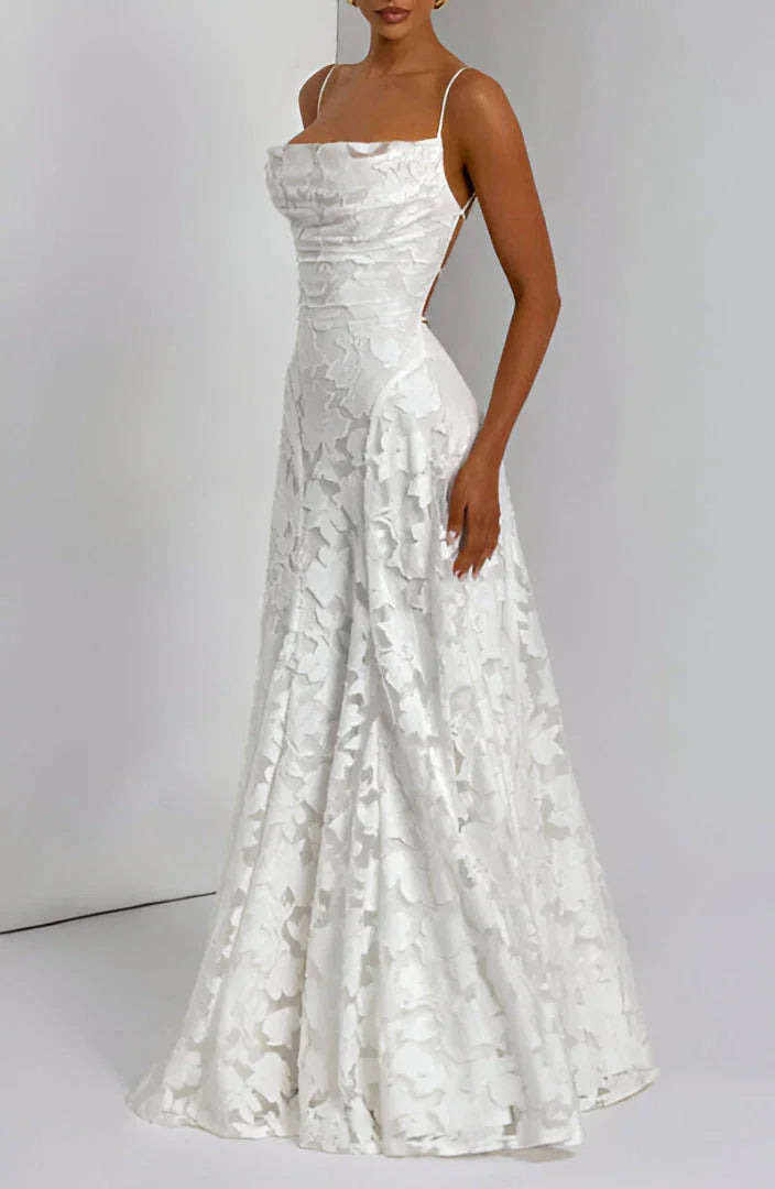 White floral spaghetti strap maxi dress with ruched bodice and flowing gathered skirt