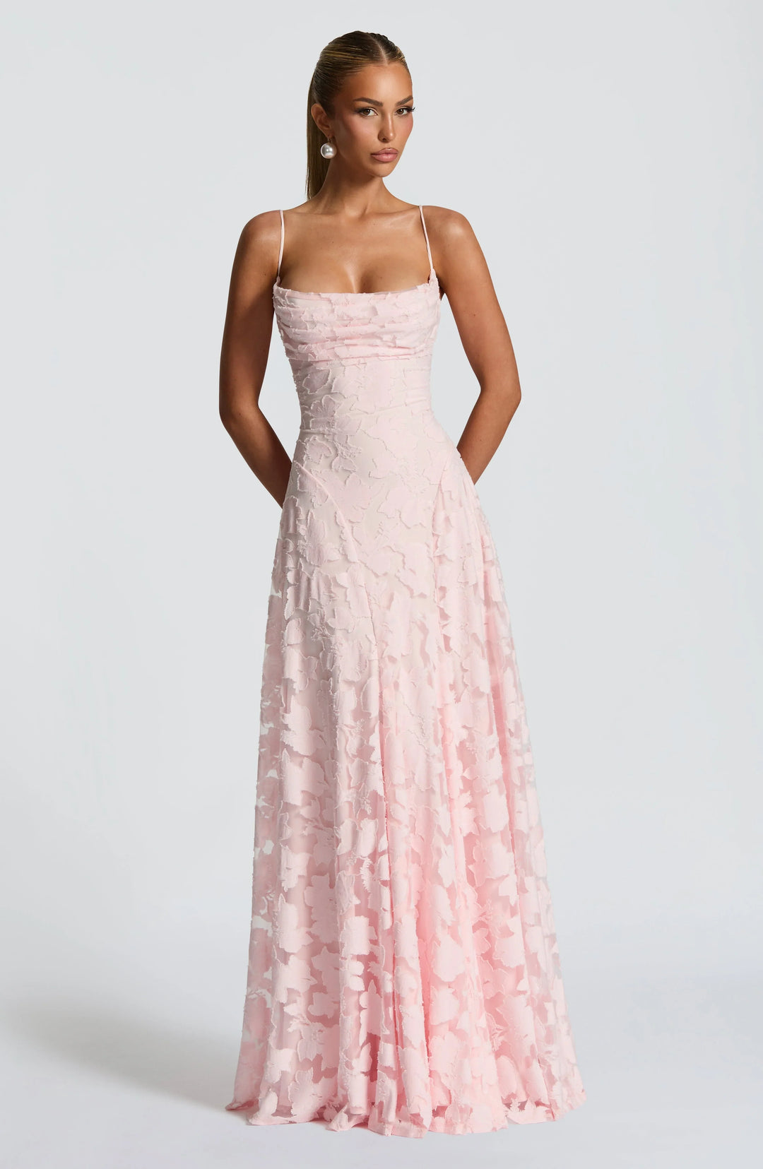 Pink floral spaghetti strap maxi dress with fitted bodice and full A-line skirt