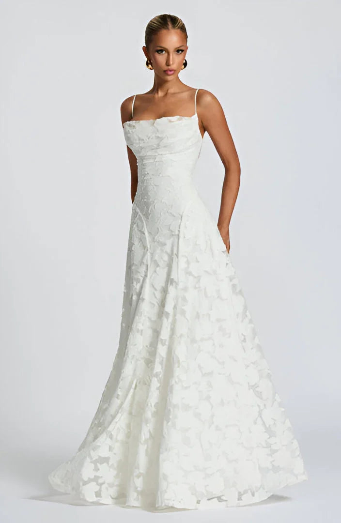 White floral spaghetti strap maxi dress with fitted bodice and full A-line skirt