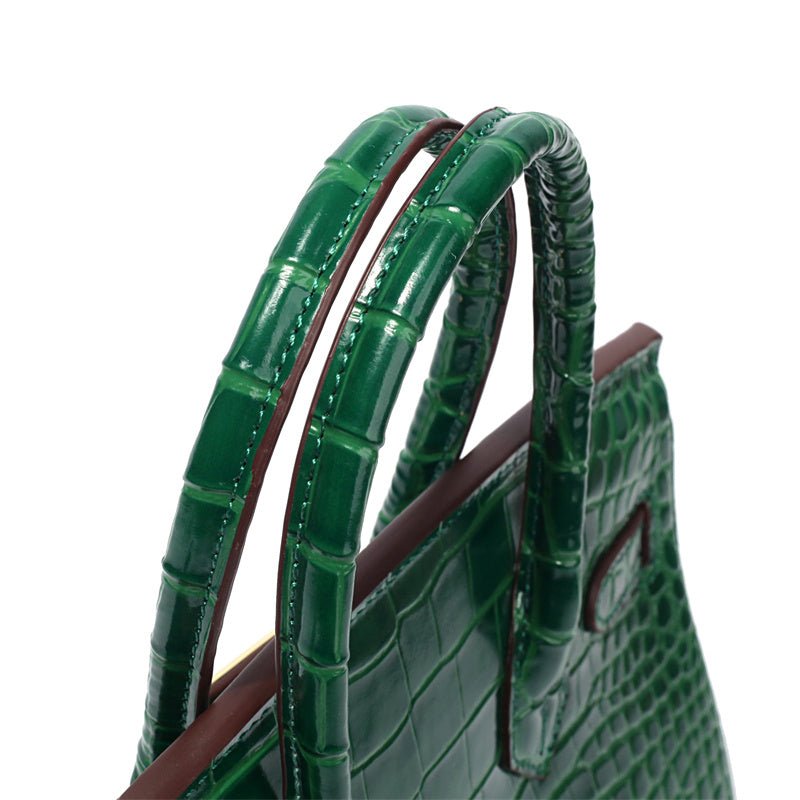 Green crocodile-textured handbag with double top handles
