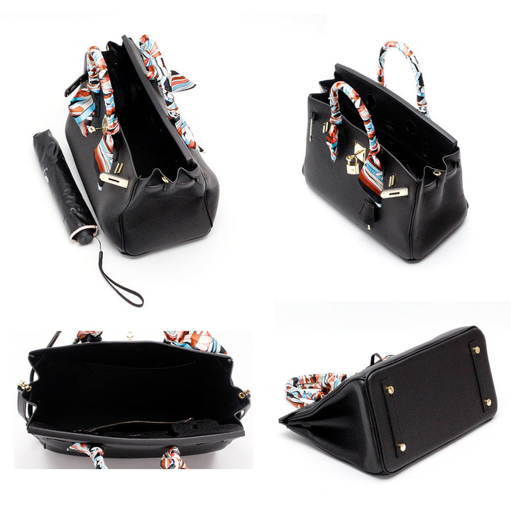 Black handbag with scarf-tie handles and gold lock hardware