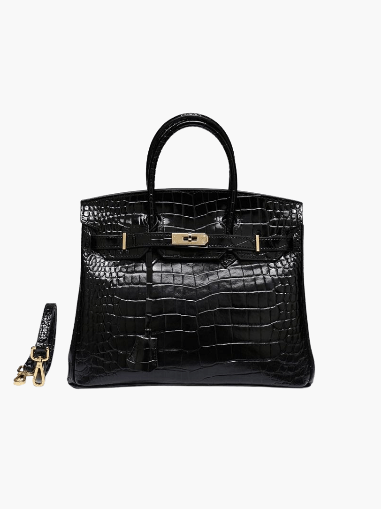 Women’s crocodile-texture handbag in black with top handles and gold-tone front clasp
