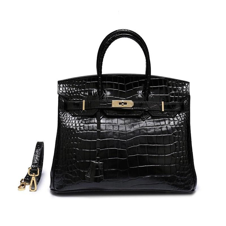 Women’s crocodile-texture handbag in black with top handles and gold-tone lock