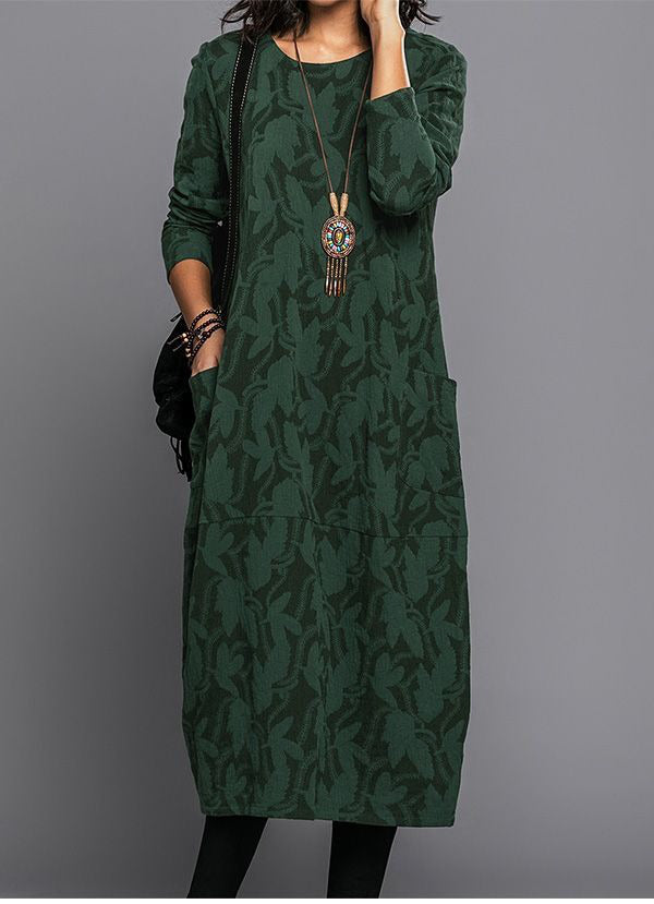 Green long sleeve midi dress with allover leaf pattern, tiered skirt