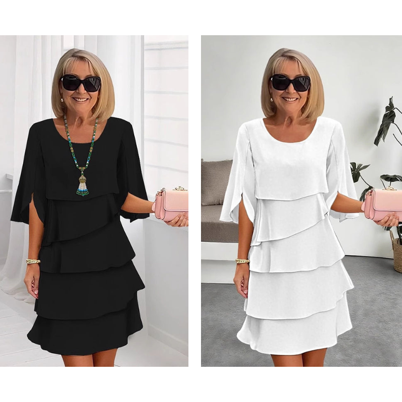 Black and white puff-sleeve layered dresses with tiered ruffle skirts