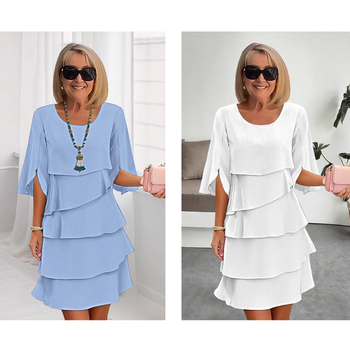 Light blue and white puff-sleeve layered dresses with tiered ruffle skirts