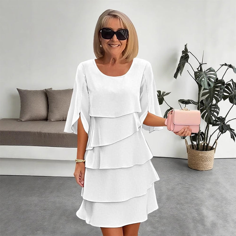 White puff-sleeve layered dress with three tier ruffle skirt