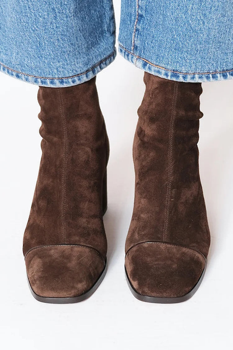 Brown suede square-toe heeled boots, rear view with side seam stitching
